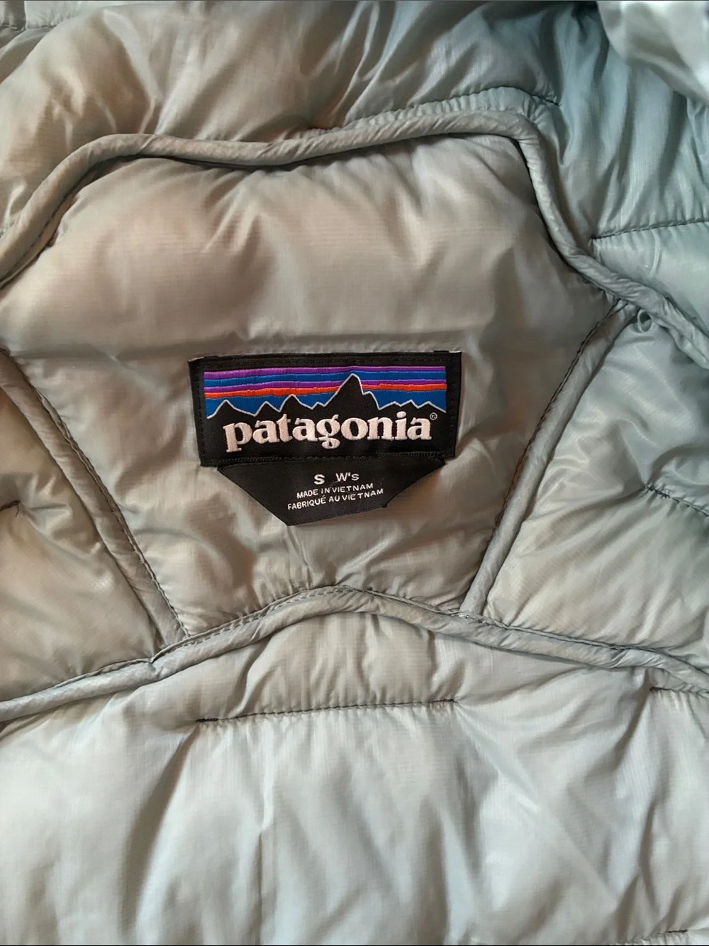 Patagonia Womens Macro Puff Hooded jacket.